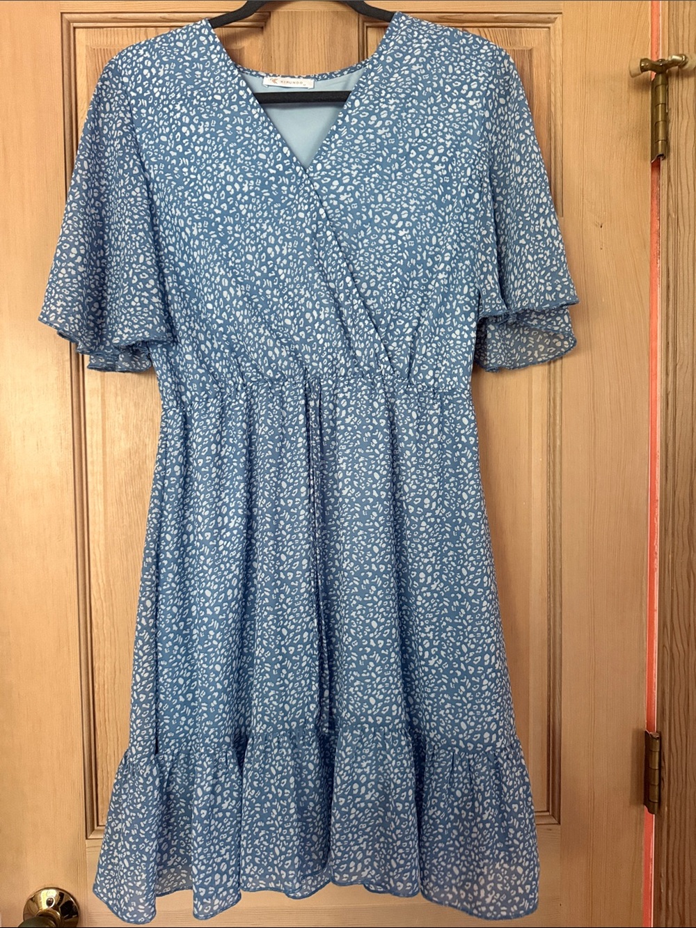 Kirundo Blue Floral Light Blue Floral Wrap-Style Midi Dress with Ruffle Hem